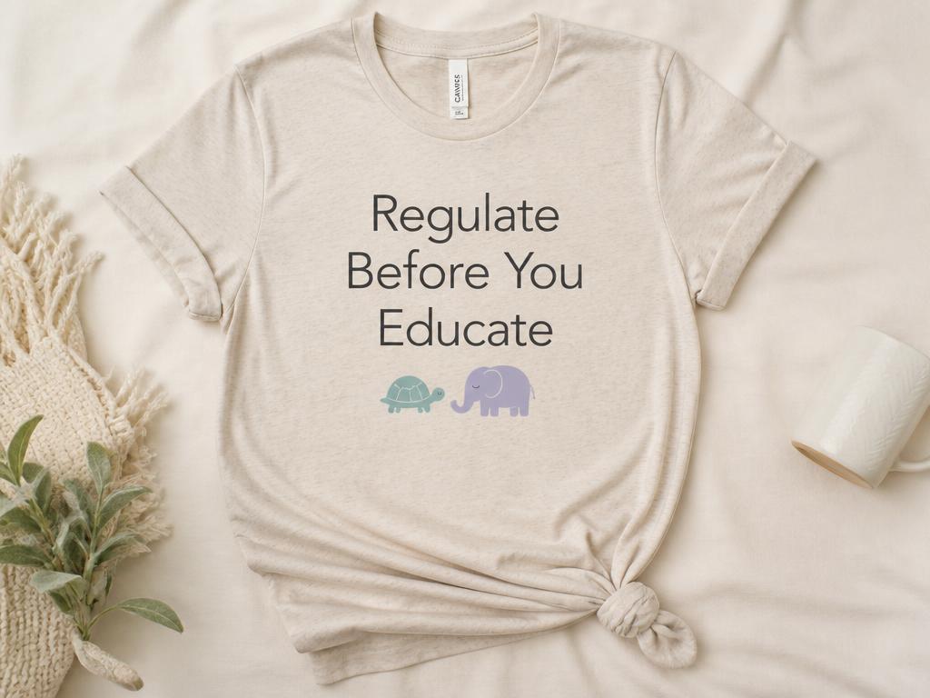 Heather sand adult tee printed with Regulate Before You Educate and a turtle and elephant